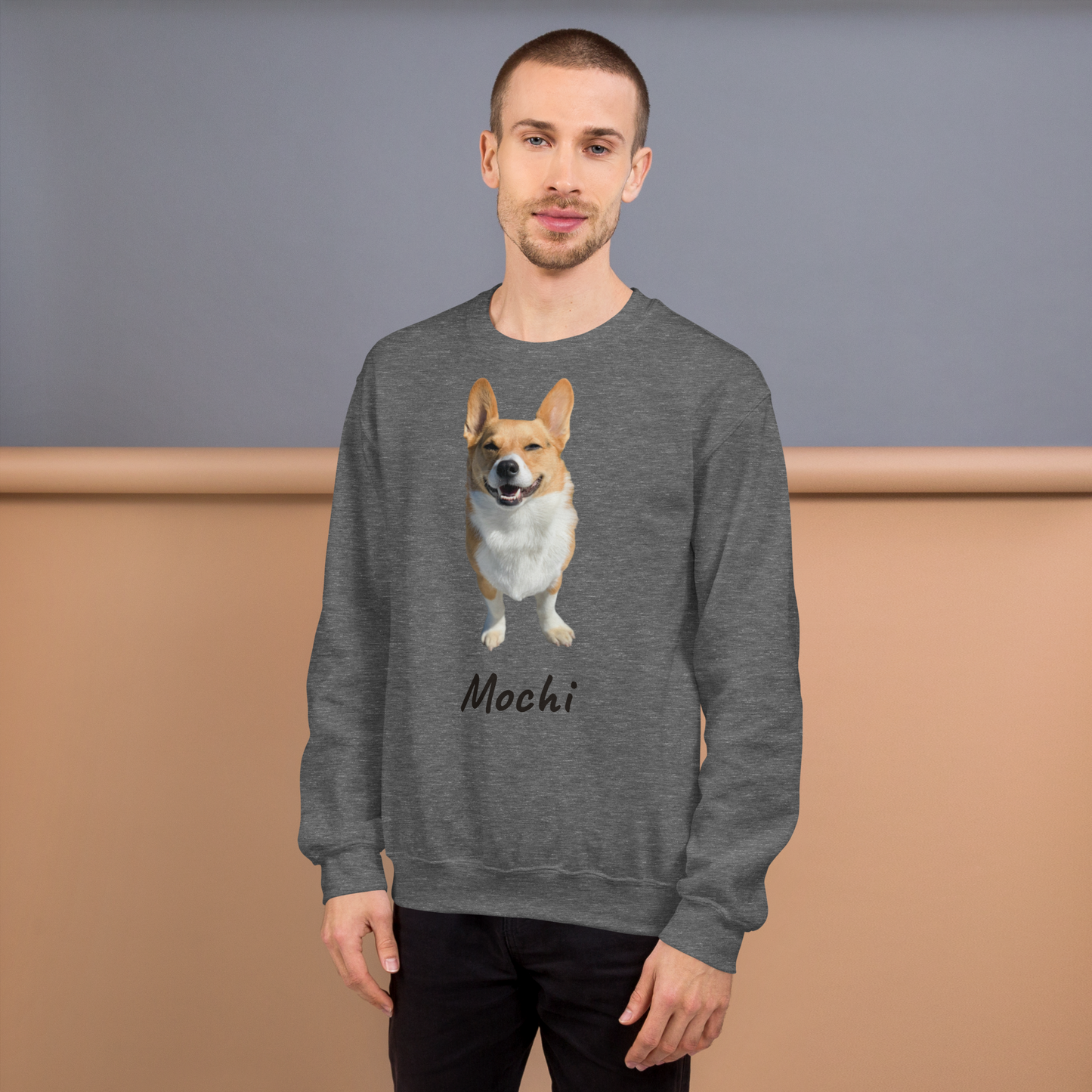 Man wearing a Graphite Heather grey custom corgi photo sweatshirt, dog dad gift